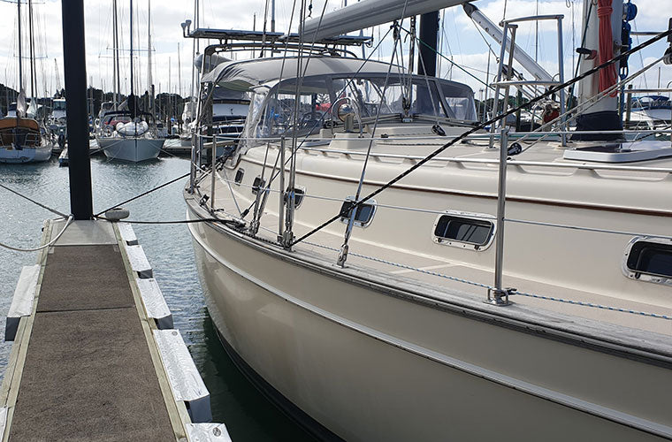 Marina berth set up with marina fenders and dock lines / mooring lines / ropes from Hauraki Fenders