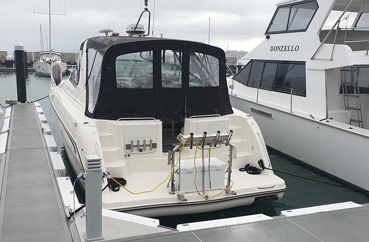 Marina berth set up with marina fenders and dock lines / mooring lines / ropes from Hauraki Fenders