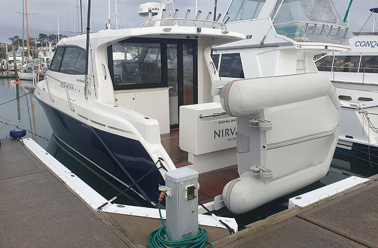 Marina berth set up with marina fenders and dock lines / mooring lines / ropes from Hauraki Fenders
